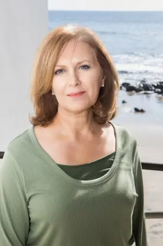 Portrait of woman near seaside rocks